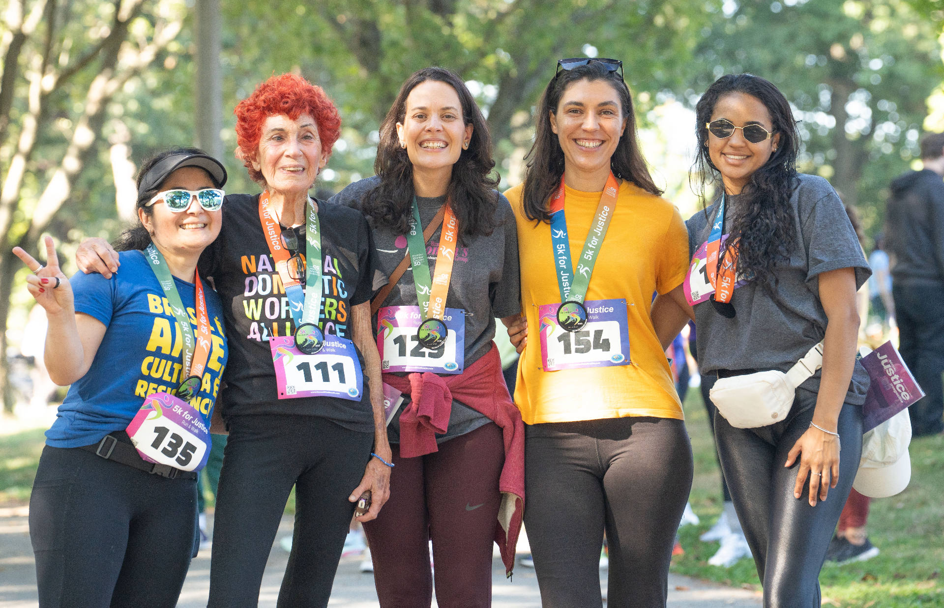 Diverse community cheering at the race